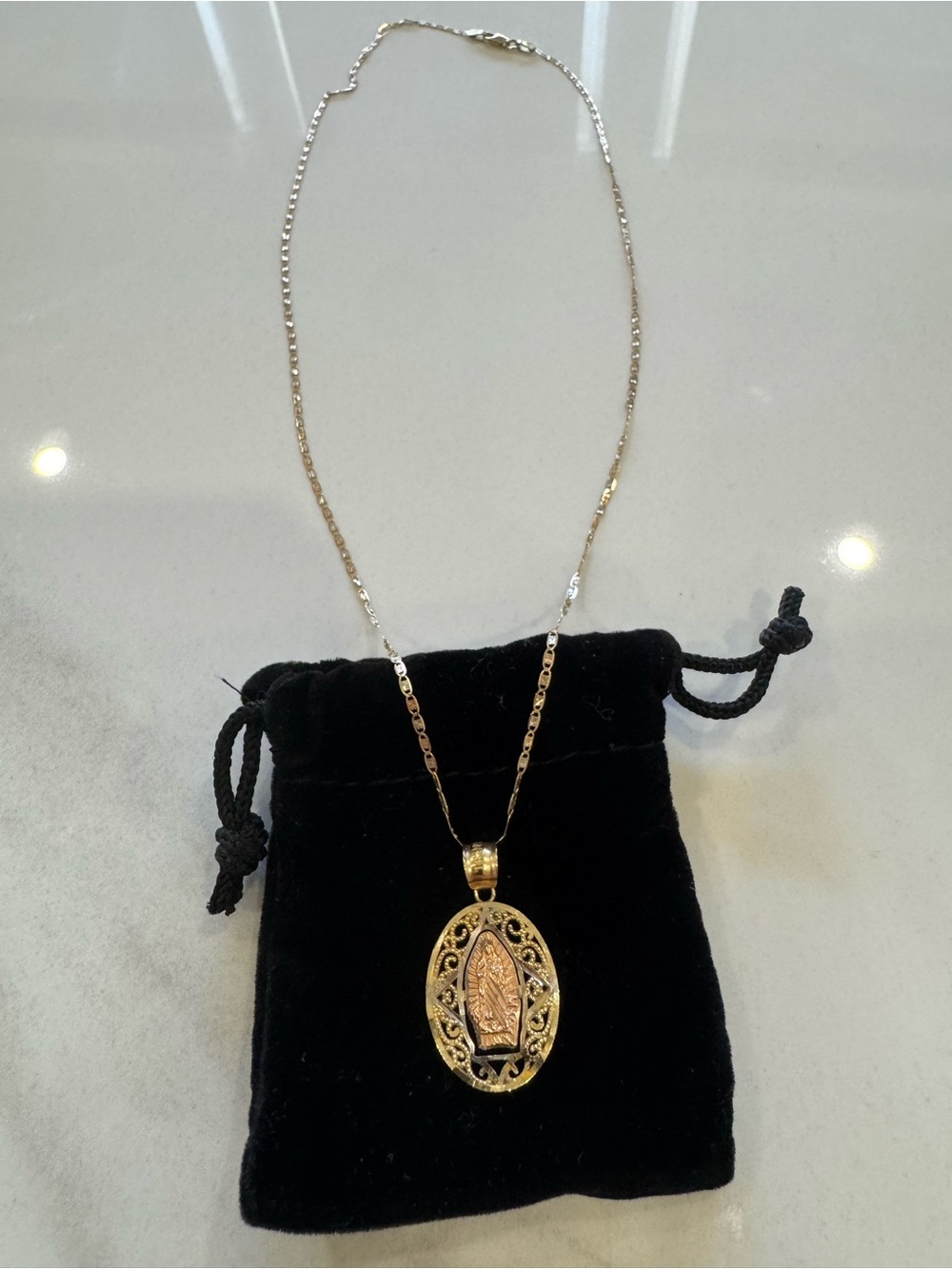 Gold plated Catholic necklace with Mother Mary